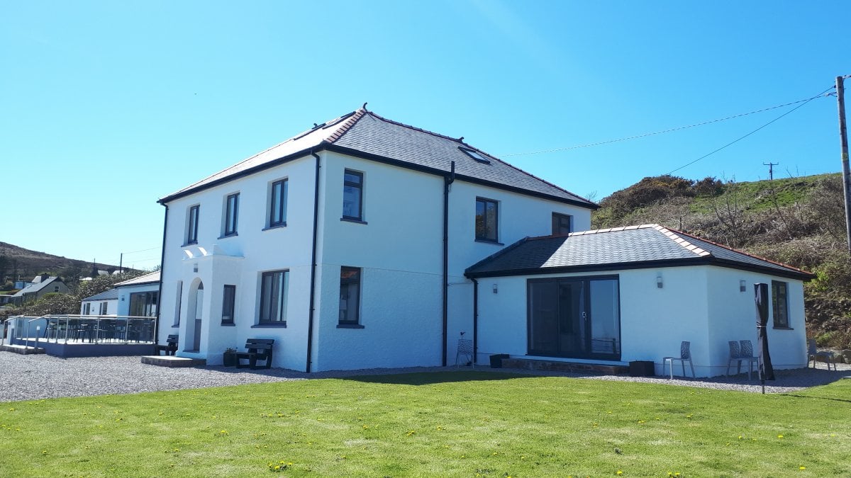 Llwynfor - external aspect with lawns and decked seating